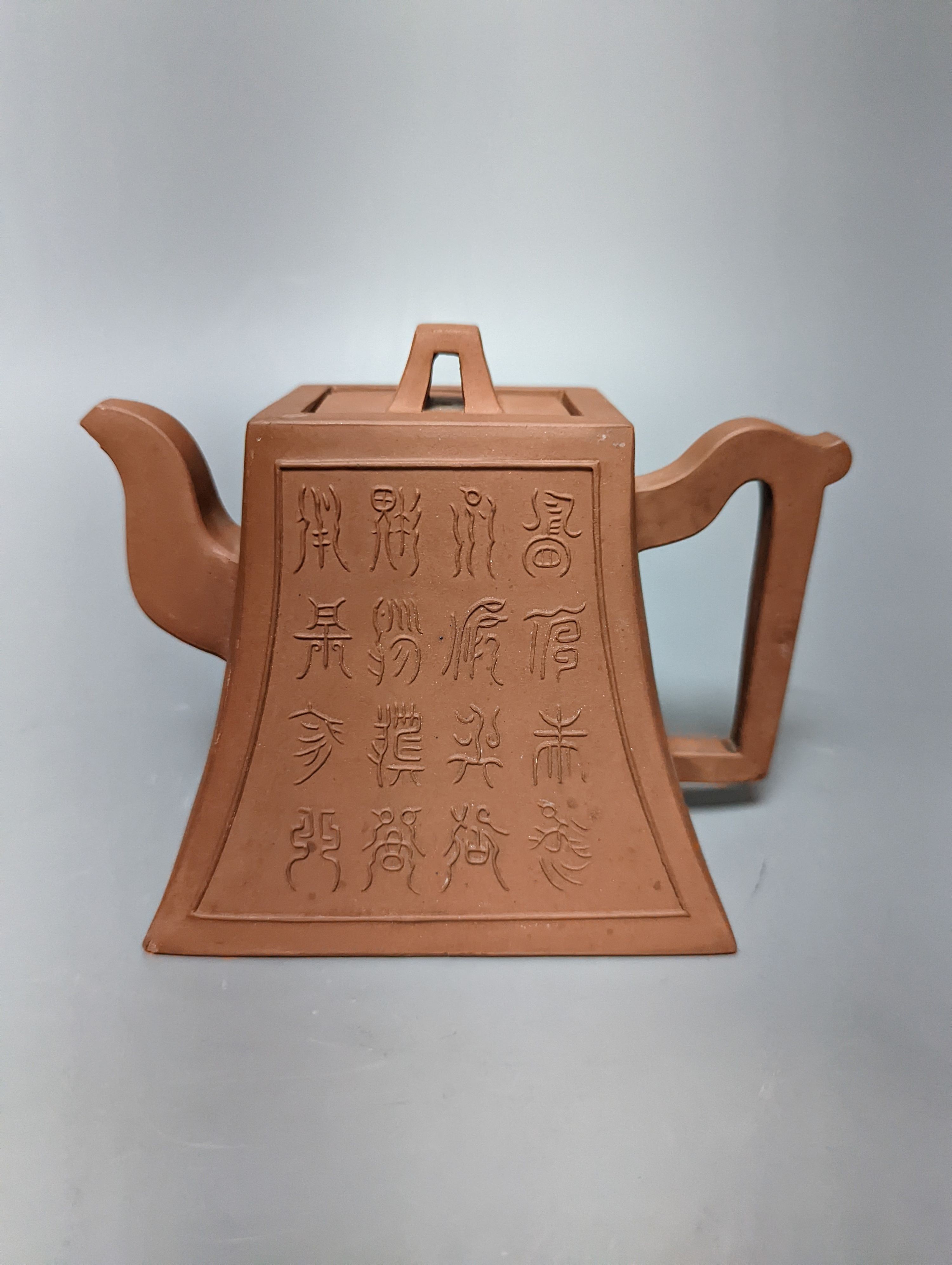 Three Chinese Yixing teapots and a carved soapstone teapot tallest 12cm